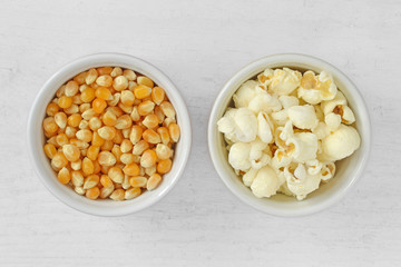 Dried corn kernels and popped popcorn in bowls