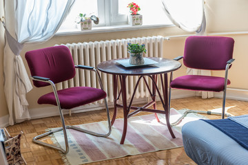 Table for two  near window in home interior