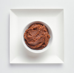 Miso paste in a white bowl