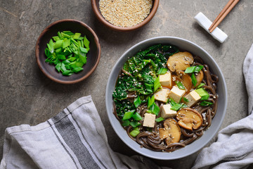 Vegetarian soup with kale mushrooms and soba noodle - Powered by Adobe