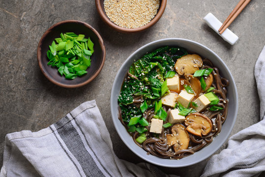 Vegetarian soup with kale mushrooms and soba noodle