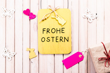 Easter chalkboard decoration background with gift box and blank sale label with copy space. 