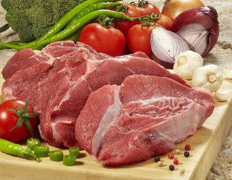 Fresh raw meat on cutting board