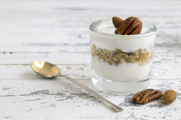 Useful homemade yogurt with nuts and muesli.