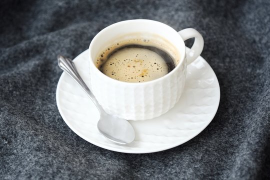 Delicious Fresh Tasty Coffee On Grey Plaid