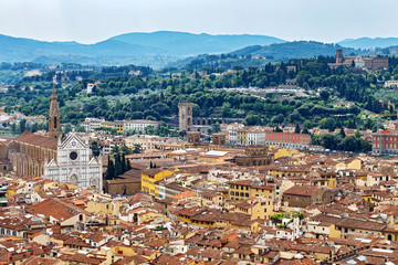 Naklejka premium op view of Florence from the Dome of Santa Maria del Fiore. Elevated view on historical center of Florence. Panorama of medieval town on sunny summer day.