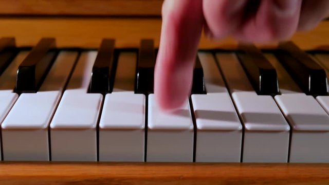 Playing the piano close up 