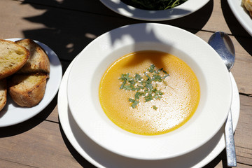 Fish soup dish from red scorpionfish, bread in the greek tavern.