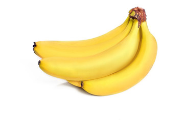 Ripe yellow bananas on a white background