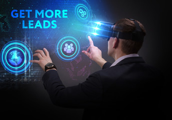 Business, Technology, Internet and network concept. Young businessman working on a virtual screen of the future and sees the inscription: Get more leads