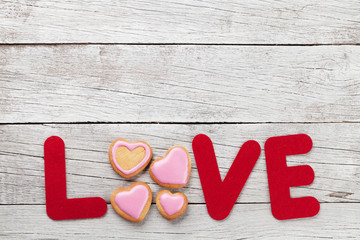 Valentines day greeting card with love word and cookies