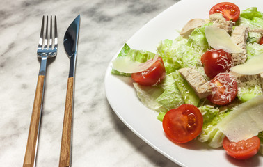 fresh vegetables salad on white plate
