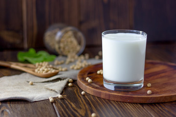Soybean milk with soy beans around it