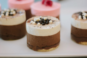 Creamy cakes with coffie at restaurant.