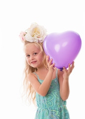 Obraz na płótnie Canvas little girl with purple baloon