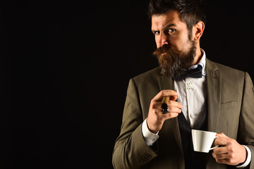 Business and bad habit concept. Businessman with suspicious face