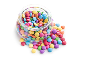 Colorful chocolate candies in jar.