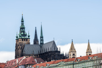 Fototapeta premium The roofs and spires of old Prague