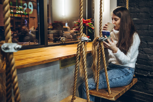 woman drink warm up tea in cafe