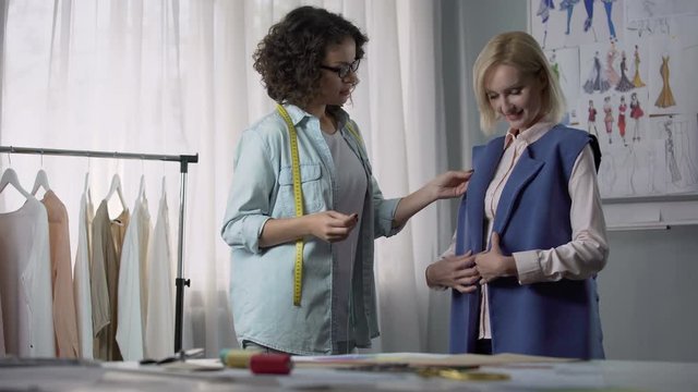 Girl came to test fitting of coat to seamstress, saying comments and remarks