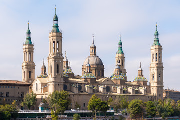 Fototapeta premium The Cathedral-Basilica of Our Lady of Pillar - a roman catholic church, Zaragoza, Spain. Copy space for text.