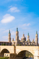 Obraz premium The Cathedral-Basilica of Our Lady of Pillar - a roman catholic church, Zaragoza, Spain. Copy space for text. Vertical.