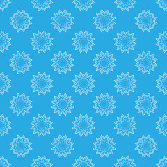 Snowflake on blue seamless pattern