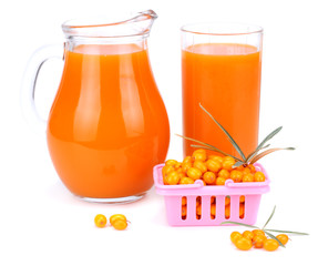 Sea buckthorn juice in glass isolated on white background