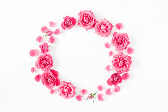 Flowers composition. Wreath made of pink rose flowers on white background. Flat lay, top view, copy space