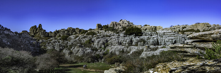 Fototapeta na wymiar Panorama view of Torcal de Antequera in Malaga, Spain, an impressive karst landscape of unusual limestones landforms