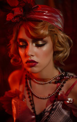 Retro portrait of a beautiful Gatsby woman. Vogue fashion style and smoke