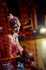 Retro portrait of a beautiful Gatsby woman. Vogue fashion style and smoke