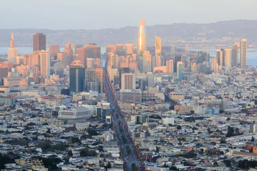 Foto op Canvas Sunset lights on San Francisco Downtown. Northeast views from Twin Peaks. © Yuval Helfman