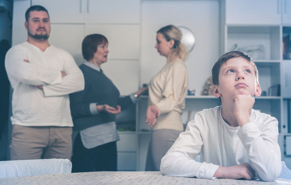 Upset son suffering from parental arguing