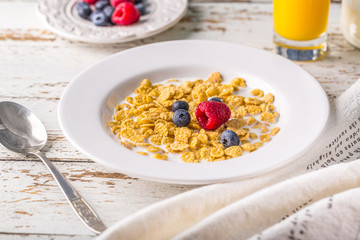 cereals with milk orange juice berries morning clock