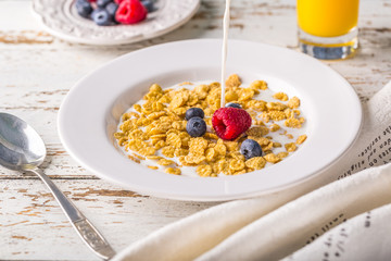 cereals with milk orange juice berries morning clock