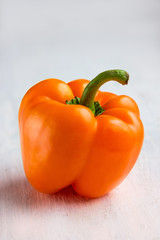 orange paprika on a white background