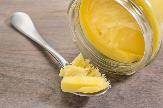 Ghee In Jar And Spoon