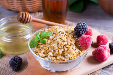 Oatmeal porridge with fresh strawberries and blackberries. Healthy breakfast, healthy eating, vegan food concept.