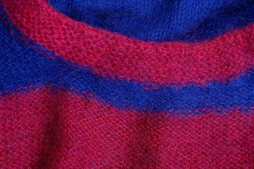 яркая цветная текстура из шерстяного свитера
