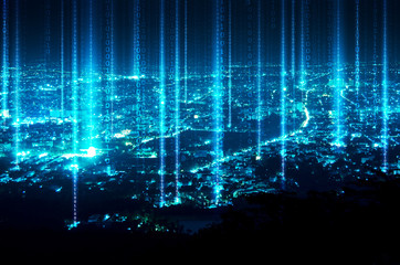 abstract light beam and digital signal over night blue city background