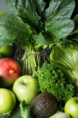 Fresh green vegetables and fruits, ingredients for dietary healthy detox smoothie or salad