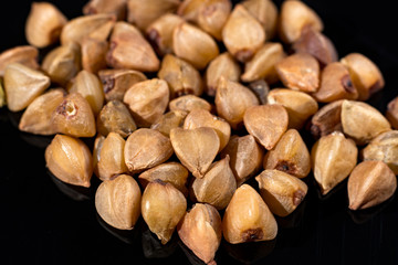 Macro collection, gluten free roasted dry boekwheat seeds close up