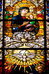 Seville, Andalusia, Spain - Detail of a stained glass window inside the Cathedral of Seville