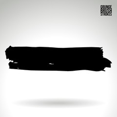 Black brush stroke and texture. Grunge vector abstract hand - painted element. Underline and border design.