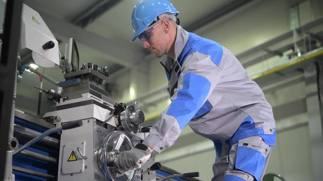 Metal Industry Footage with Caucasian Metal Lathe Operator in Action