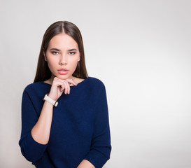 beautiful young woman with long hair wearing wrist watch