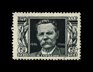 Maxim Gorky aka Alexei Maximovich Peshkov (1868-1936), famous Russian writer, dramatist, politician, circa 1946. canceled vintage stamp printed in the USSR (Soviet Union) isolated on black background.
