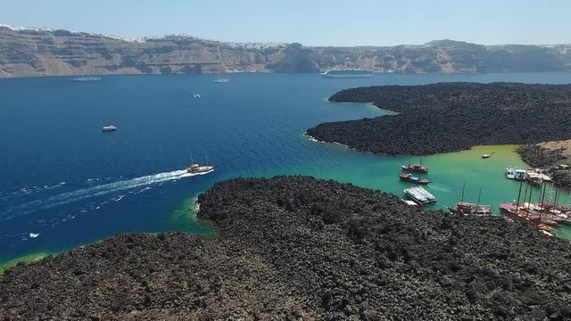 4K Drone Shot Of The Volcanic Nea Kameni Island Near Santorini, Greece