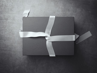 Black gift box with white decoration ribbon. 3d rendering